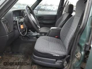 2000 Jeep Cherokee Classic with VIN 1J4FF58S3YL104384, listed as a Copart auction lot 46645415 with 253,730 mi miles and Salvage Title. Bid and sale history available at carsss.com. Image 7.