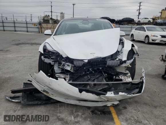 2023 Tesla Model 3 z VIN 5YJ3E1EA1PF561521, wystawiony jako Copart lot #55637855 z przebiegiem 83 008 mil mil oraz Szkoda całkowita • Salvage title. Historia ofert i sprzedaży dostępna na DreamBid. Obrazek 5.