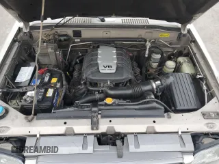 2000 Isuzu Trooper S with VIN JACDJ58X9Y7J18322, listed as a Copart auction lot 42444695 with 149,799 mi miles and Salvage title. Bid and sale history available at DreamBid. Image 12.
