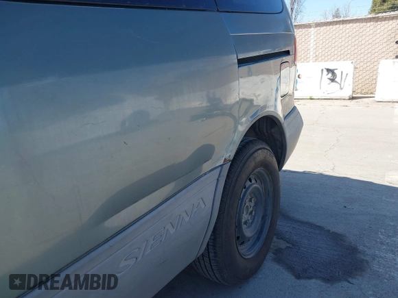 1999 Toyota Sienna LE with VIN 4T3ZF13C1XU097653, listed as a IAAI auction lot 41765274 with 236,625 mi miles. Bid and sale history available at carsss.com. Image 15.
