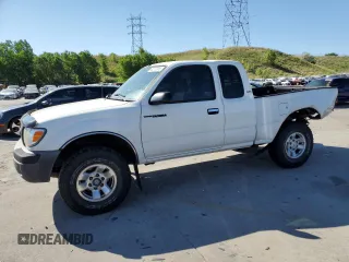 2000 Toyota Tacoma with VIN 4TAWM72N1YZ614333, listed as a Copart auction lot 63273915 with 126,616 mi miles and Salvage title. Bid and sale history available at DreamBid. Image 1.