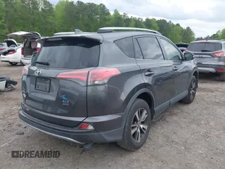 2018 Toyota RAV4 XLE with VIN JTMRFREV2JJ730874, listed as a IAAI auction lot 41980075 with 60,268 mi miles. Bid and sale history available at carsss.com. Image 4.