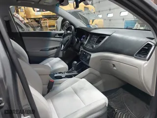 2018 Hyundai Tucson Value with VIN KM8J3CA22JU688957, listed as a IAAI auction lot 41868195 with 117,256 mi miles. Bid and sale history available at carsss.com. Image 5.
