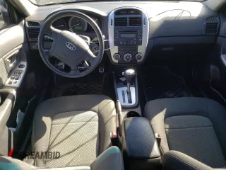 2009 Kia Spectra EX with VIN KNAFE221395026165, listed as a Copart auction lot 73715994 with 245,813 mi miles and Salvage Title. Bid and sale history available at carsss.com. Image 8.