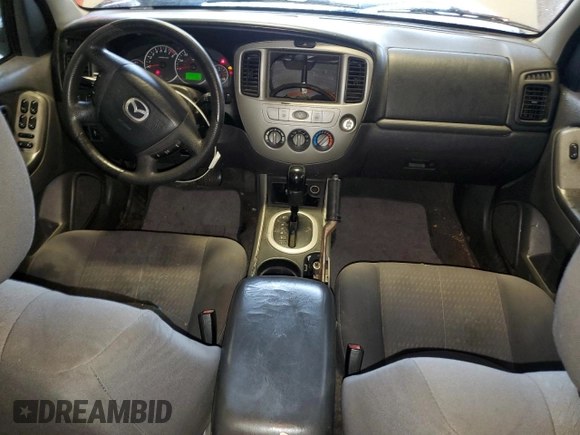 2006 Mazda Tribute i with VIN 4F2YZ02Z86KM02172, listed as a Copart auction lot 73214254 with 317,446 mi miles and Salvage Title. Bid and sale history available at DreamBid. Image 8.