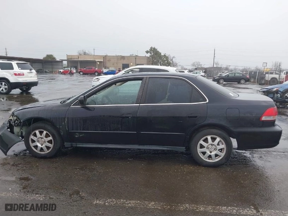 2002 Honda Accord Sdn SE with VIN 1HGCG66842A032599, listed as a IAAI auction lot 41491093 with 188,685 mi miles. Bid and sale history available at carsss.com. Image 14.