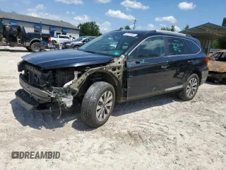 2018 Subaru Outback Touring with VIN 4S4BSETC4J3343024, listed as a Copart auction lot 63670305 with 174,823 mi miles and Salvage title. Bid and sale history available at DreamBid. Image 1.