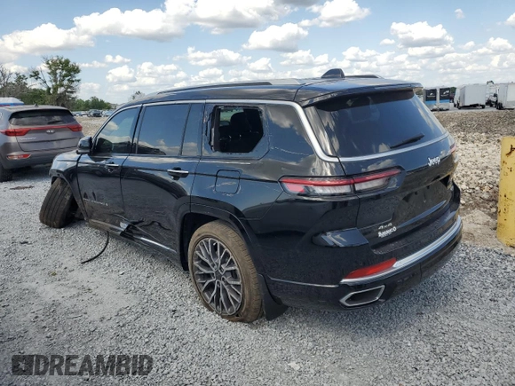 2023 Jeep Grand Cherokee Summit Reserve with VIN 1C4RJKEG5P8853916, listed as a Copart auction lot 52691735 with 18,899 mi miles and Salvage title. Bid and sale history available at DreamBid. Image 2.