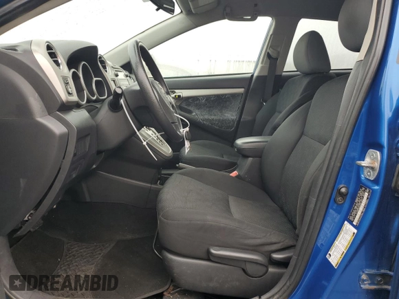 2009 Toyota Matrix S with VIN 2T1LE40E29C011912, listed as a Copart auction lot 57103465 with 128,900 mi miles and Salvage title. Bid and sale history available at DreamBid. Image 7.
