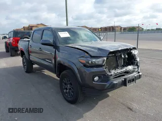 2022 Toyota Tacoma SR with VIN 3TMCZ5AN8NM498933, listed as a IAAI auction lot 42532018 with 56,469 mi miles and . Bid and sale history available at DreamBid. Image 1.