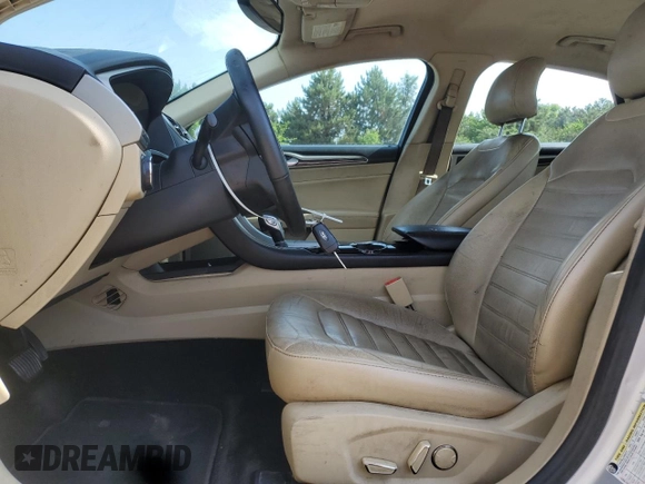 2016 Ford Fusion SE z VIN 3FA6P0HDXGR369218, wystawiony jako Copart lot #61225875 z przebiegiem 176 559 mil mil oraz Szkoda całkowita • Salvage title. Historia ofert i sprzedaży dostępna na DreamBid. Obrazek 7.