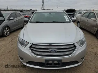 2016 Ford Taurus SEL with VIN 1FAHP2E9XGG144955, listed as a Copart auction lot 82207634 with 128,823 mi miles and Salvage Title. Bid and sale history available at DreamBid. Image 5.