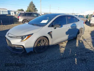 2021 Toyota Corolla SE with VIN 5YFS4MCE1MP081078, listed as a IAAI auction lot 41539795 with 59,499 mi miles. Bid and sale history available at carsss.com. Image 2.