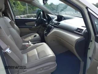 2016 Honda Odyssey EX-L z VIN 5FNRL5H64GB059309, wystawiony jako IAAI lot #42367538 z przebiegiem 121 742 mil mil oraz . Historia ofert i sprzedaży dostępna na DreamBid. Obrazek 5.