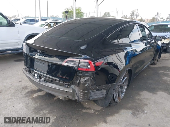 2023 Tesla Model 3 z VIN 5YJ3E1EA1PF546324, wystawiony jako IAAI lot #42103745 z przebiegiem 33 284 mil mil oraz . Historia ofert i sprzedaży dostępna na DreamBid. Obrazek 4.