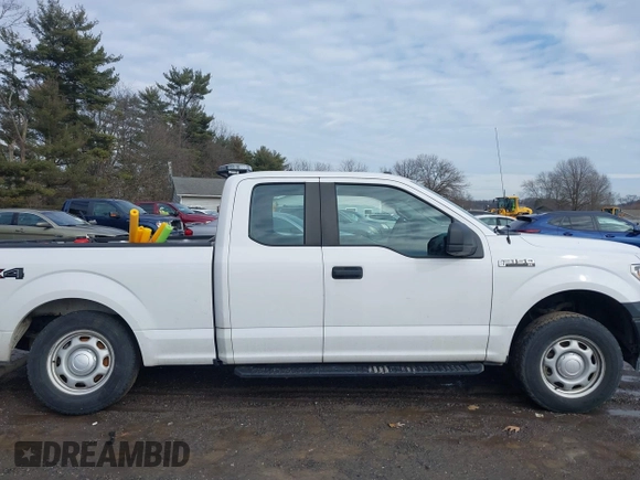 2019 Ford F-150 XL with VIN 1FTFX1E52KKD85097, listed as a IAAI auction lot 41479169 with 96,713 mi miles and . Bid and sale history available at DreamBid. Image 14.