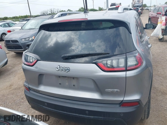 2021 Jeep Cherokee Altitude with VIN 1C4PJLLB2MD164004, listed as a IAAI auction lot 42083946 with 99,136 mi miles and . Bid and sale history available at DreamBid. Image 16.