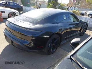 2022 Porsche Taycan z VIN WP0AA2Y10NSA11640, wystawiony jako IAAI lot #41215410 z przebiegiem 25 749 mil mil oraz . Historia ofert i sprzedaży dostępna na DreamBid. Obrazek 4.