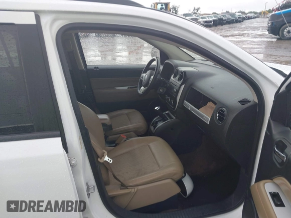 2016 Jeep Compass Latitude with VIN 1C4NJCEA6GD792633, listed as a IAAI auction lot 42240729 with 154,163 mi miles and . Bid and sale history available at DreamBid. Image 5.