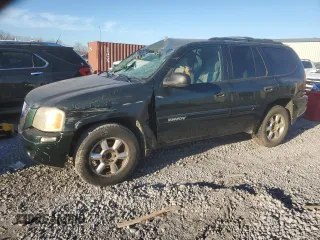 2003 GMC Envoy SLE with VIN 1GKDS13S732336708, listed as a Copart auction lot 88040595 with 354,751 mi miles and Salvage Title. Bid and sale history available at carsss.com. Image 1.