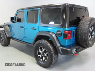 2020 Jeep Wrangler Unlimited Rubicon z VIN 1C4HJXFG0LW141133, wystawiony jako Copart lot #59150925 z przebiegiem 61 973 mil mil oraz Szkoda całkowita • Salvage title. Historia ofert i sprzedaży dostępna na DreamBid. Obrazek 4.
