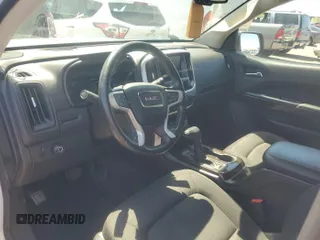 2021 GMC Canyon 2WD Elevation z VIN 1GTG5CEN5M1140499, wystawiony jako IAAI lot #42556124 z przebiegiem 41 450 mil mil oraz . Historia ofert i sprzedaży dostępna na DreamBid. Obrazek 9.