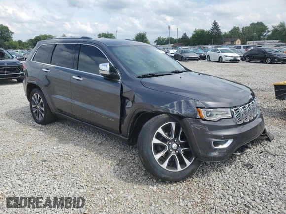 2017 Jeep Grand Cherokee Overland z VIN 1C4RJFCG1HC684826, wystawiony jako Copart lot #59971595 z przebiegiem 101 765 mil mil oraz Szkoda całkowita • Salvage title. Historia ofert i sprzedaży dostępna na DreamBid. Obrazek 4.