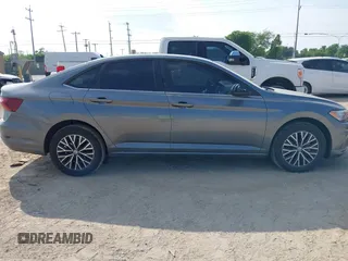 2021 Volkswagen Jetta S z VIN 3VWC57BU0MM093075, wystawiony jako IAAI lot #42067395 z przebiegiem 24 930 mil mil oraz . Historia ofert i sprzedaży dostępna na DreamBid. Obrazek 13.
