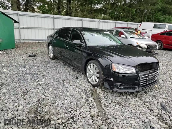 2016 Audi A8 Sport z VIN WAU43AFD2GN005719, wystawiony jako Copart lot #60746275 z przebiegiem 125 802 mil mil oraz Szkoda całkowita • Salvage title. Historia ofert i sprzedaży dostępna na DreamBid. Obrazek 13.
