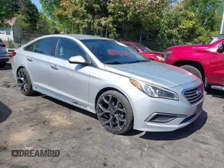 2015 Hyundai Sonata Sport with VIN 5NPE34AF6FH256579, listed as a IAAI auction lot 42052813 with 103,988 mi miles and . Bid and sale history available at DreamBid. Image 1.