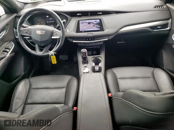 2023 Cadillac XT4 FWD Premium Luxury with VIN 1GYFZCR42PF110122, listed as a Copart auction lot 57332955 with 11,427 mi miles and Salvage title. Bid and sale history available at DreamBid. Image 8.