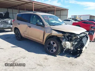 2009 Toyota RAV4 with VIN JTMZF33V995000660, listed as a IAAI auction lot 41633209 with 106,959 mi miles. Bid and sale history available at carsss.com. Image 1.