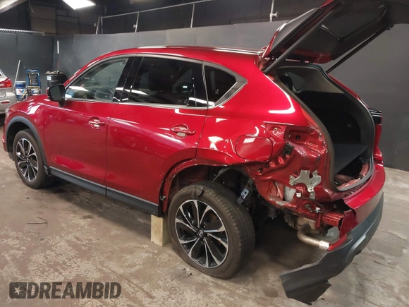 2023 Mazda CX-5 2.5 S Premium Plus Package with VIN JM3KFBEM5P0164568, listed as a IAAI auction lot 41843961 with 22,891 mi miles. Bid and sale history available at carsss.com. Image 3.
