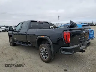 2021 GMC Sierra 3500HD AT4 z VIN 1GT49VEYXMF124749, wystawiony jako Copart lot #69328184 z przebiegiem 79 678 mil mil oraz Szkody całkowita. Historia ofert i sprzedaży dostępna na DreamBid. Obrazek 2.