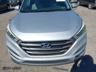 2016 Hyundai Tucson Sport with VIN KM8J33A25GU224084, listed as a IAAI auction lot 41827851 with 153,348 mi miles. Bid and sale history available at carsss.com. Image 6.