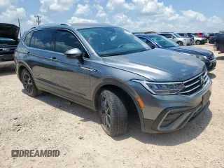 2024 Volkswagen Tiguan SE with VIN 3VV3B7AX4RM061942, listed as a Copart auction lot 61206695 with 27,128 mi miles and Salvage title. Bid and sale history available at DreamBid. Image 4.