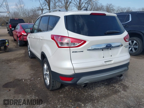 2015 Ford Escape Titanium with VIN 1FMCU9J98FUC76491, listed as a IAAI auction lot 41790638 with 158,196 mi miles and . Bid and sale history available at DreamBid. Image 3.