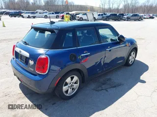 2015 MINI Hardtop 4 Door with VIN WMWXS5C58FT829805, listed as a IAAI auction lot 42023026 with 141,330 mi miles and . Bid and sale history available at DreamBid. Image 4.