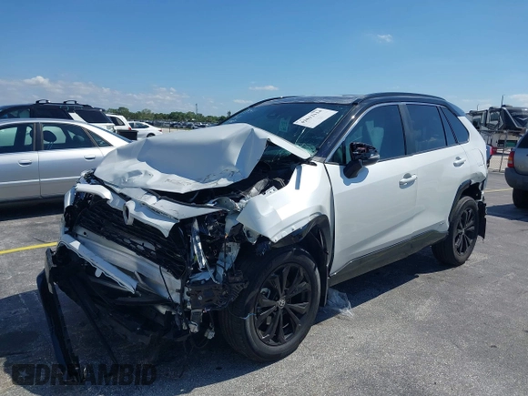 2024 Toyota RAV4 Hybrid XSE with VIN 2T3E6RFV9RW077941, listed as a IAAI auction lot 42012134 with 31,009 mi miles and . Bid and sale history available at DreamBid. Image 17.