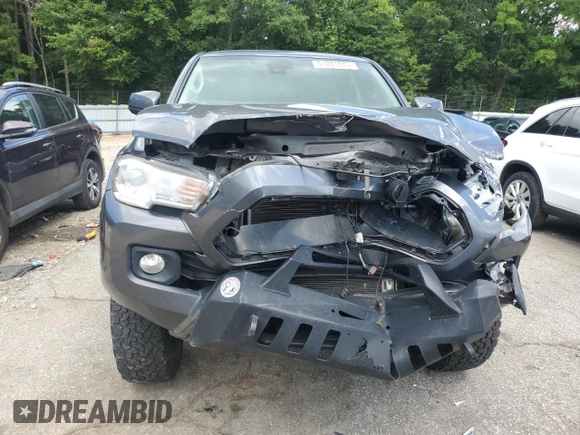 2022 Toyota Tacoma SR with VIN 3TYAX5GN2NT046114, listed as a Copart auction lot 61281875 with 57,726 mi miles and Salvage title. Bid and sale history available at DreamBid. Image 5.