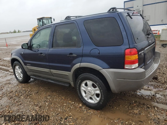 2002 Ford Escape XLT Choice with VIN 1FMYU04182KD34094, listed as a Copart auction lot 57299225 with 154,784 mi miles and Salvage title. Bid and sale history available at DreamBid. Image 2.