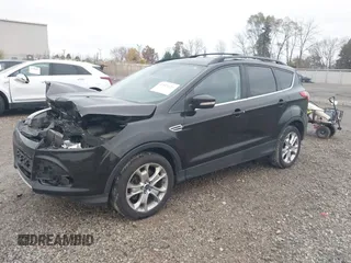 2013 Ford Escape SEL with VIN 1FMCU9H95DUC64995, listed as a IAAI auction lot 40821020 with 120,114 mi miles. Bid and sale history available at carsss.com. Image 2.