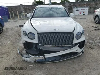 2021 Bentley Bentayga V8 z VIN SJAAM2ZV6MC033822, wystawiony jako Copart lot #60594003 z przebiegiem Nie podano mil oraz . Historia ofert i sprzedaży dostępna na DreamBid. Obrazek 5.