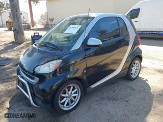 2008 Smart fortwo Pure with VIN WMEEJ31X28K187372, listed as a IAAI auction lot 41993316 with 113,248 mi miles. Bid and sale history available at carsss.com. Image 2.