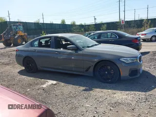 2021 BMW 5 Series 540i xDrive with VIN WBA73BJ03MWX30307, listed as a IAAI auction lot 41891615 with 27,374 mi miles and . Bid and sale history available at DreamBid. Image 13.