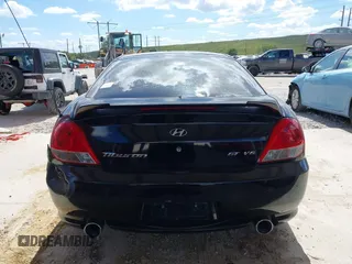 2006 Hyundai Tiburon GT z VIN KMHHN65F56U224768, wystawiony jako IAAI lot #40672721 z przebiegiem 158 535 mil mil oraz . Historia ofert i sprzedaży dostępna na DreamBid. Obrazek 17.