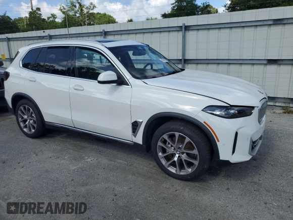 2024 BMW X5 xDrive40i with VIN 5UX23EU0XR9V36288, listed as a Copart auction lot 60028085 with Not provided miles and Salvage title. Bid and sale history available at DreamBid. Image 4.