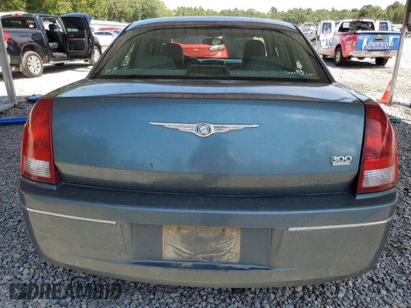 2005 Chrysler 300 Touring z VIN 2C3JA53G65H574021, wystawiony jako Copart lot #70073414 z przebiegiem 291 219 mil mil oraz Szkoda całkowita • Salvage title. Historia ofert i sprzedaży dostępna na DreamBid. Obrazek 6.