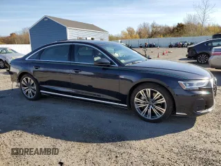 2023 Audi A8 with VIN WAULDAF86PN002950, listed as a Copart auction lot 77352374 with 4,444 mi miles and Salvage Title. Bid and sale history available at carsss.com. Image 4.