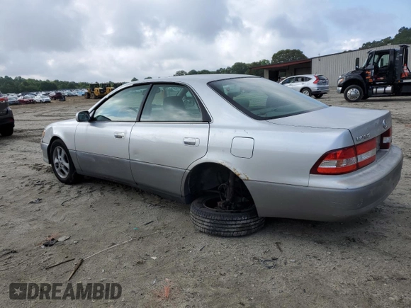 2001 Lexus ES 300 with VIN JT8BF28G410325142, listed as a Copart auction lot 58033085 with 202,542 mi miles and Salvage title. Bid and sale history available at DreamBid. Image 2.